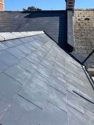 Grey tiled roof. AK Roofing and Property Maintenance